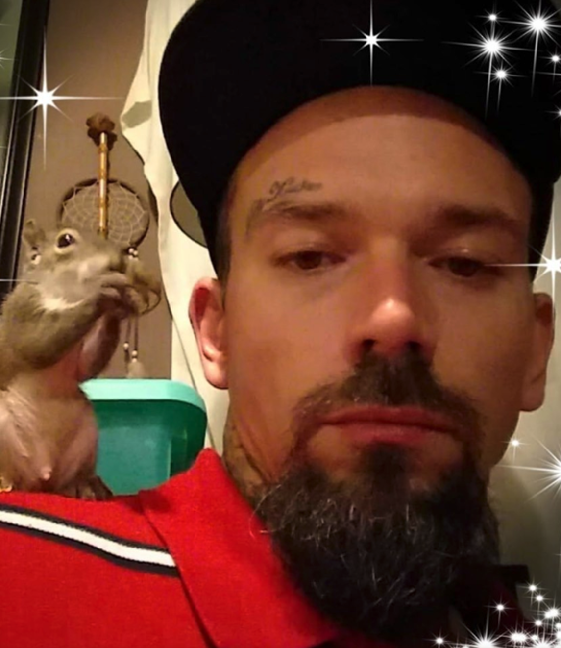 A squirrel is pictured next to Mickey Paulk in a Facebook profile picture.